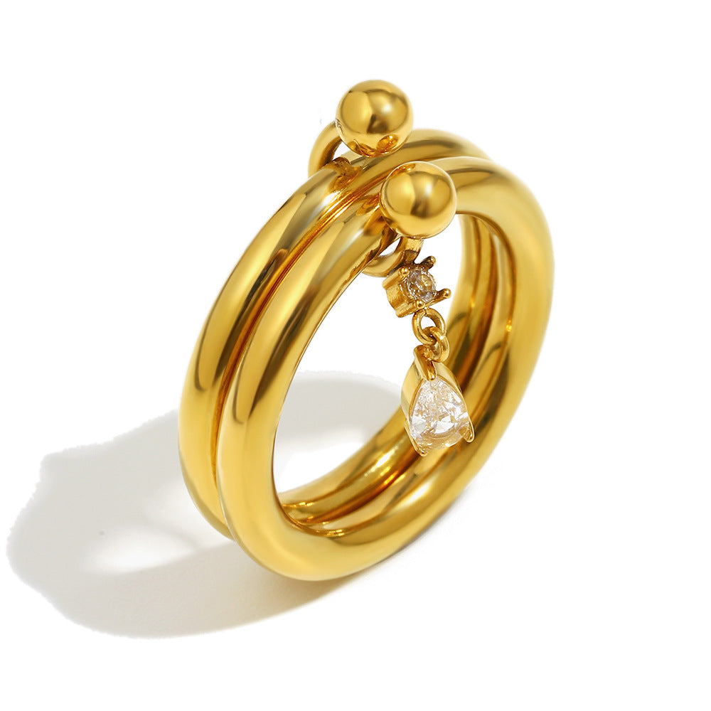 Anillo Minimalista de Acero Inoxidable Geométrico con Chapado en Oro de 18K y Circonita Cúbica en Forma de Marquesa