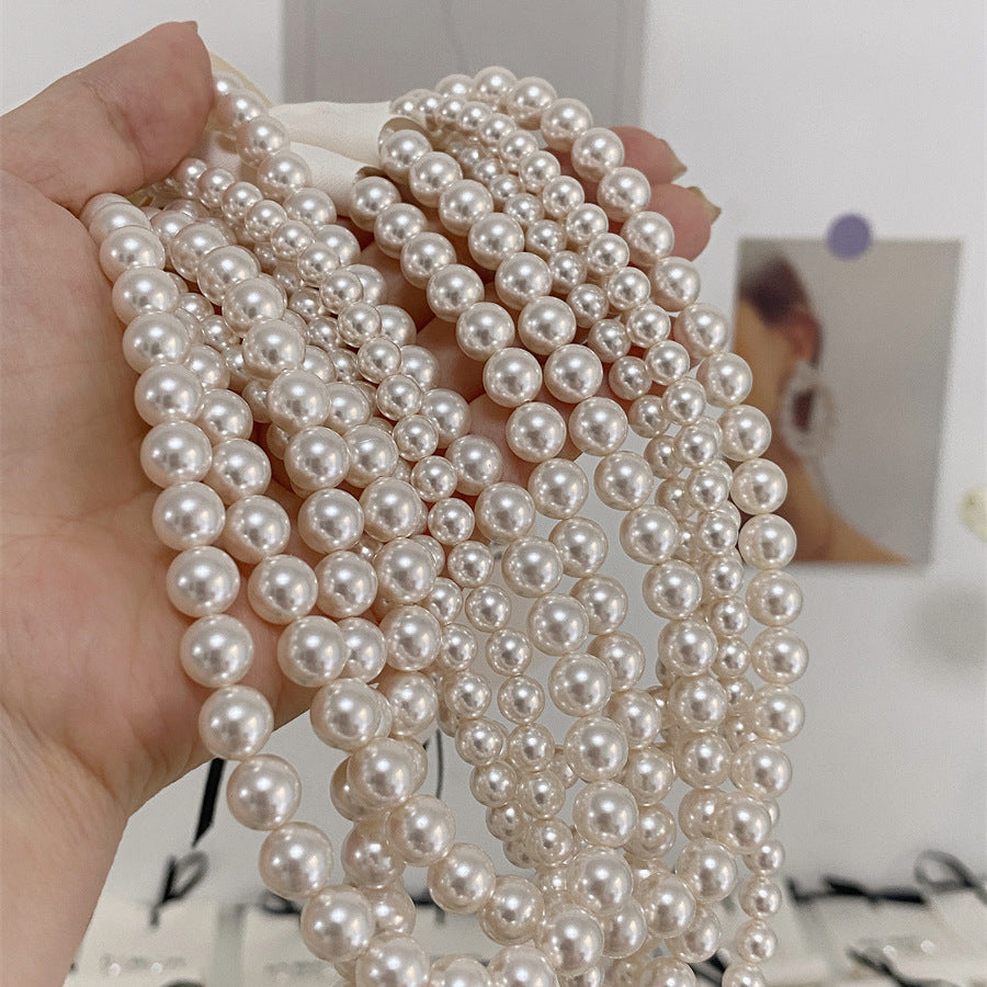 Elegante Collana da Donna Ispirata alla Francia con Perle e Pendente a U, Accenti di Perle Sintetiche e Madreperla, Finitura Placcata, Delicata Catena alla Clavicola