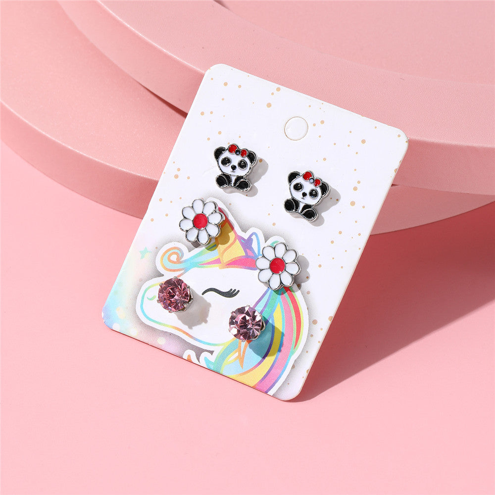Juego de pendientes de unicornio de dibujos animados con arcoíris para niños, aleación con acabado esmaltado e incrustaciones de cristal rosa