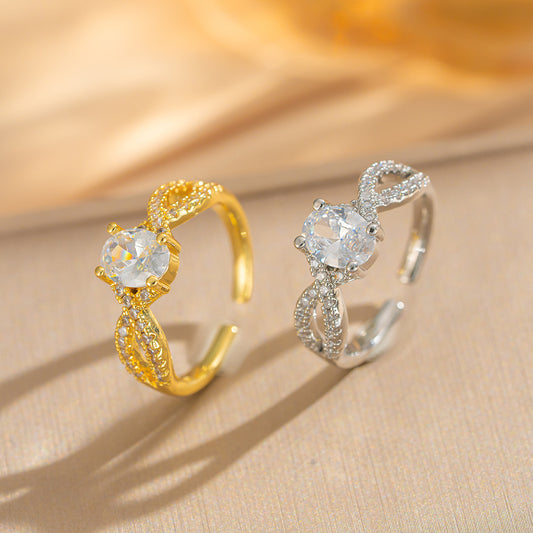 Anello da donna di lusso minimalista a forma di fiocco, in rame placcato oro 18 carati con strass pavé