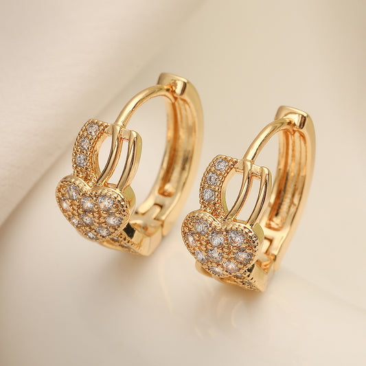 Pendientes de aro minimalistas de cobre chapado en oro con circonitas incrustadas en forma de corazón geométrico para mujer