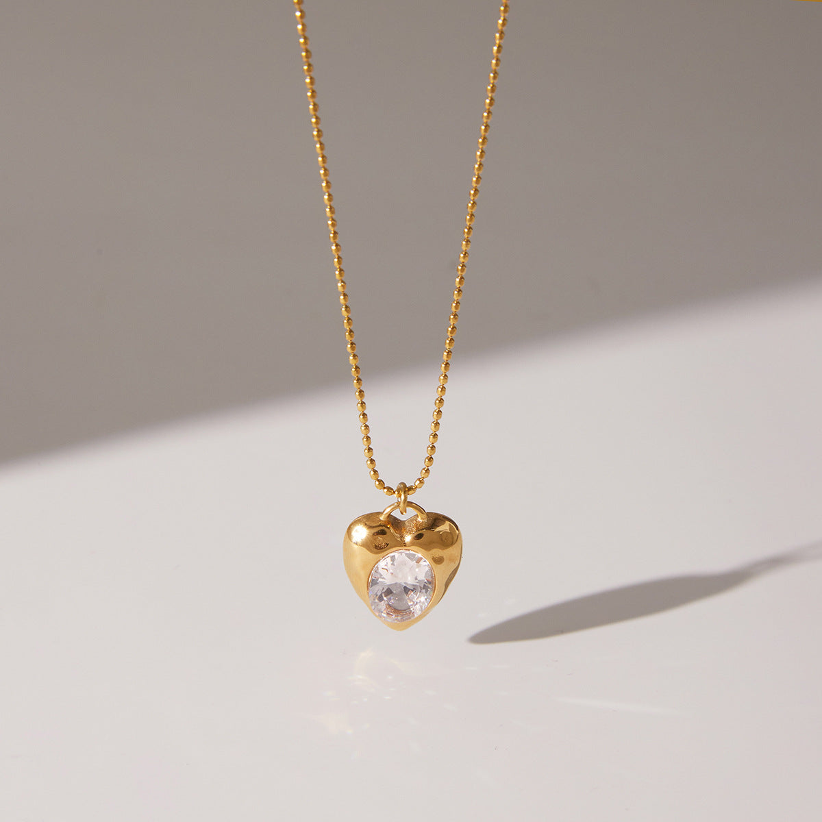 Collar con colgante de corazón minimalista de acero de titanio con chapado en oro al vacío PVD para mujer