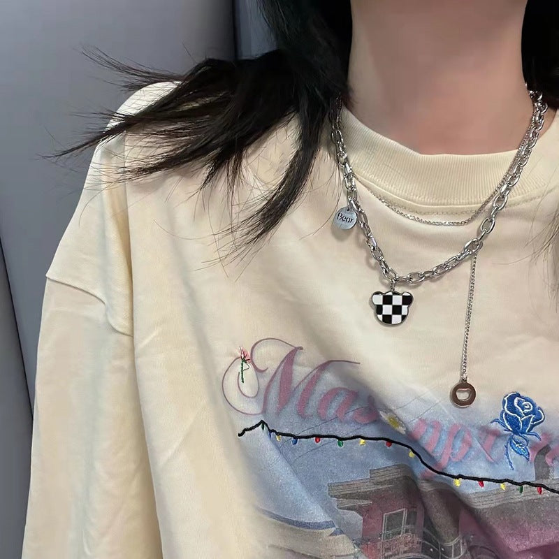 Collana minimalista a doppio strato in acciaio al titanio a quadri con orsetto per uomo e donna con finitura placcata