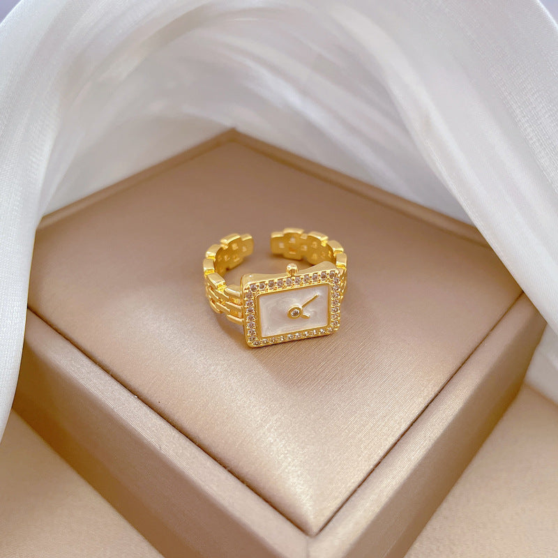 Anillo ajustable minimalista con incrustaciones de diamantes de imitación con diseño de corona para mujer, base de latón con chapado en oro