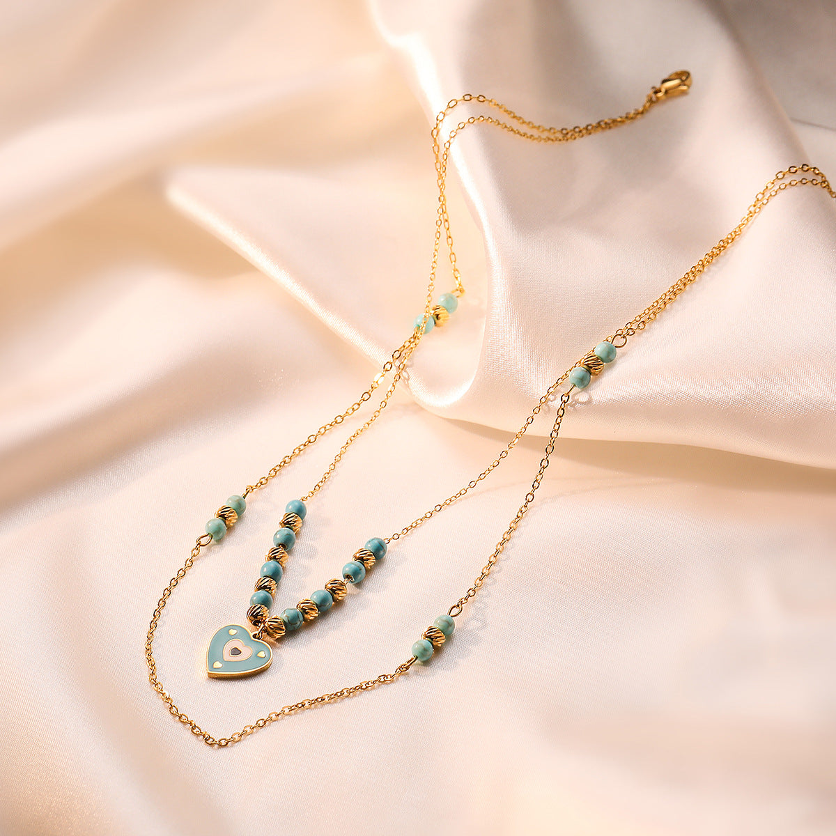 Collana con Ciondolo a Cuore Occhio di Allah in Stile Bohémien in Acciaio al Titanio per Donna