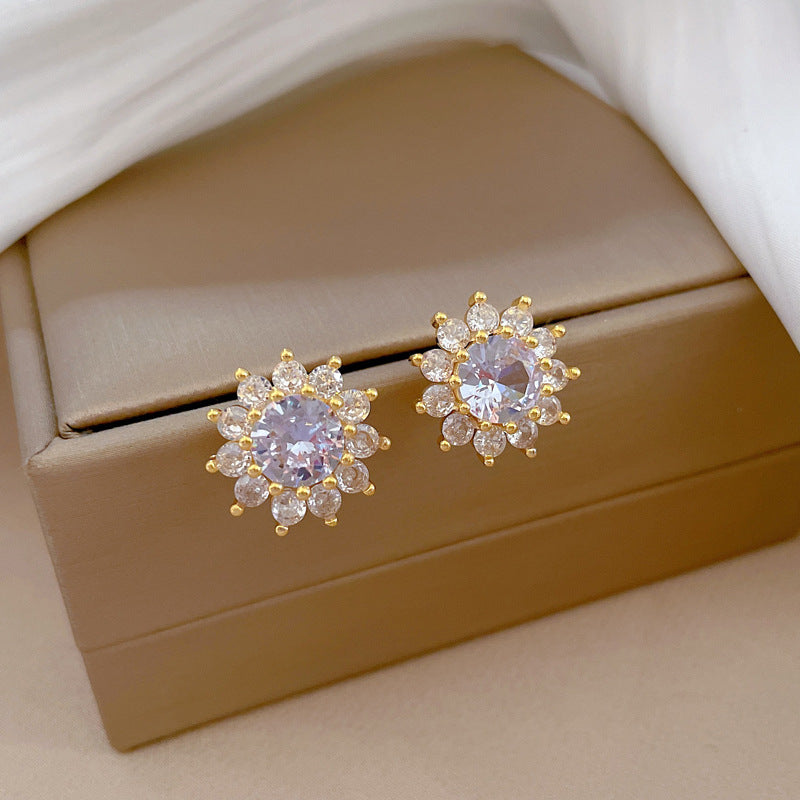Set di collana e orecchini a girasole geometrico in acciaio al titanio placcato di lusso