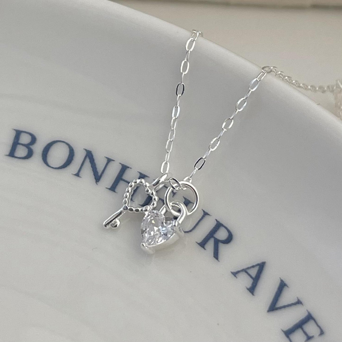 Minimalist Heart-Shaped 925 Sterling Silver Key Pendant Necklace with Rhinestone Inlay on Snake Chain for Women