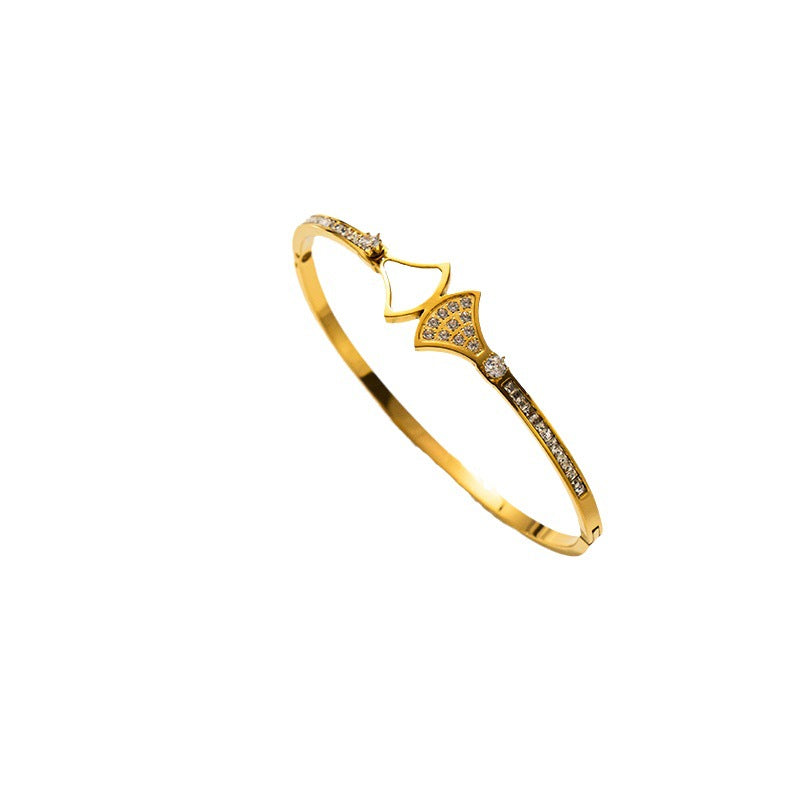 Pulsera minimalista de concha redonda de acero de titanio con acabado chapado al vacío para mujer