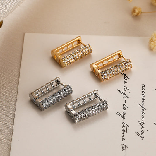 Orecchini a perno geometrici minimalisti in rame placcato oro vero con intarsio in zircone per donna