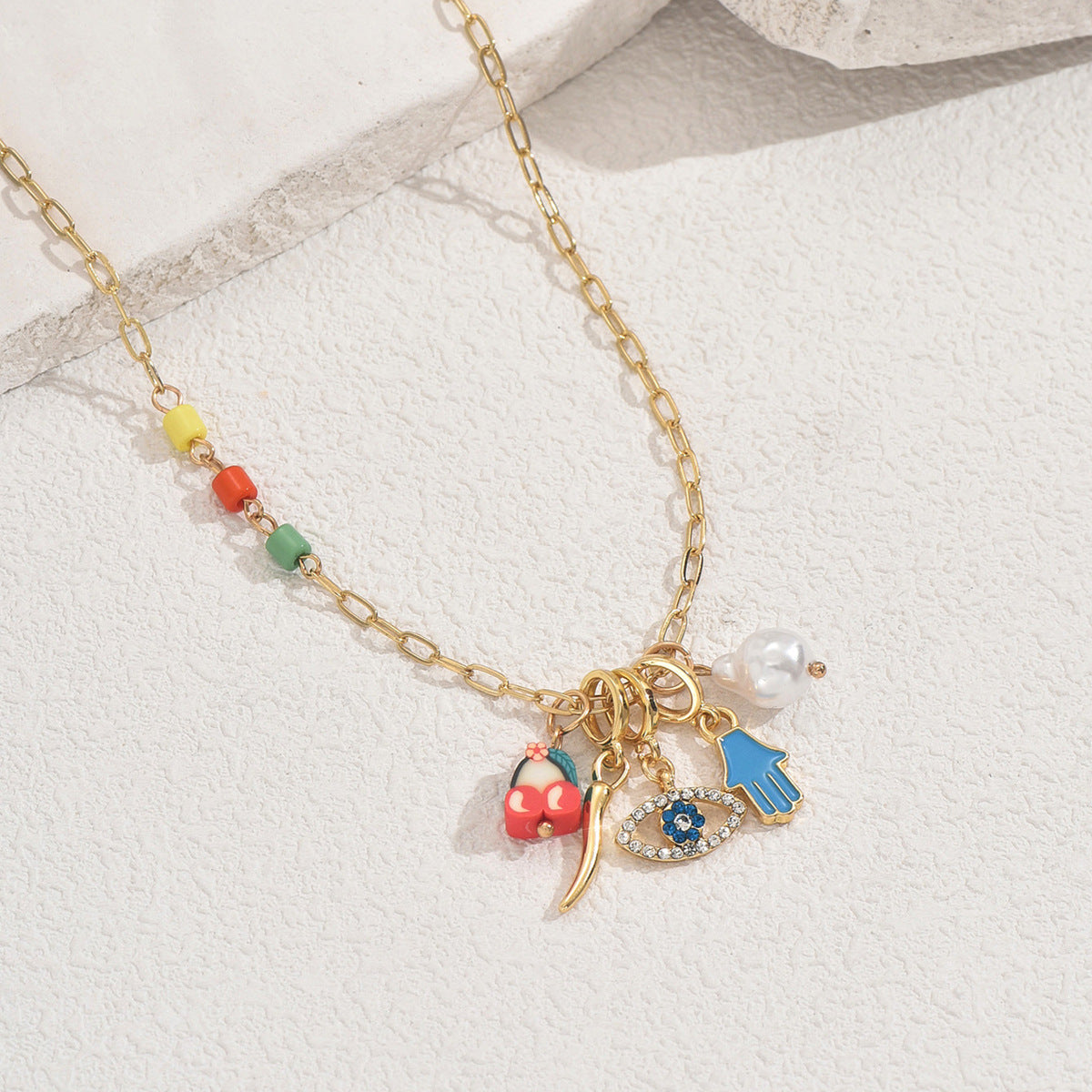 Collana pendente a forma di occhio alla moda da donna in smalto con intarsio di strass su catena di rame