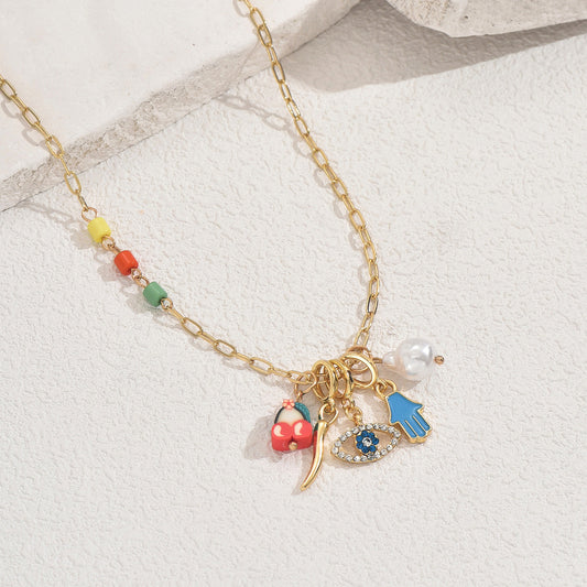Collar con colgante esmaltado con forma de ojo de moda para mujer con incrustaciones de diamantes de imitación en cadena de cobre