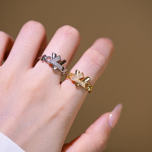 Set di Bracciale e Anello con Zirconi Micro-Incassato a X Minimalista e Bracciale Rigido Regolabile in Rame Placcato Oro per Donna
