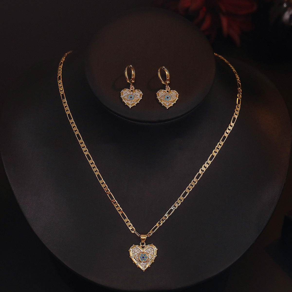Set di collana e orecchini a cuore con occhio di Allah minimalista in rame con intarsio di zirconi
