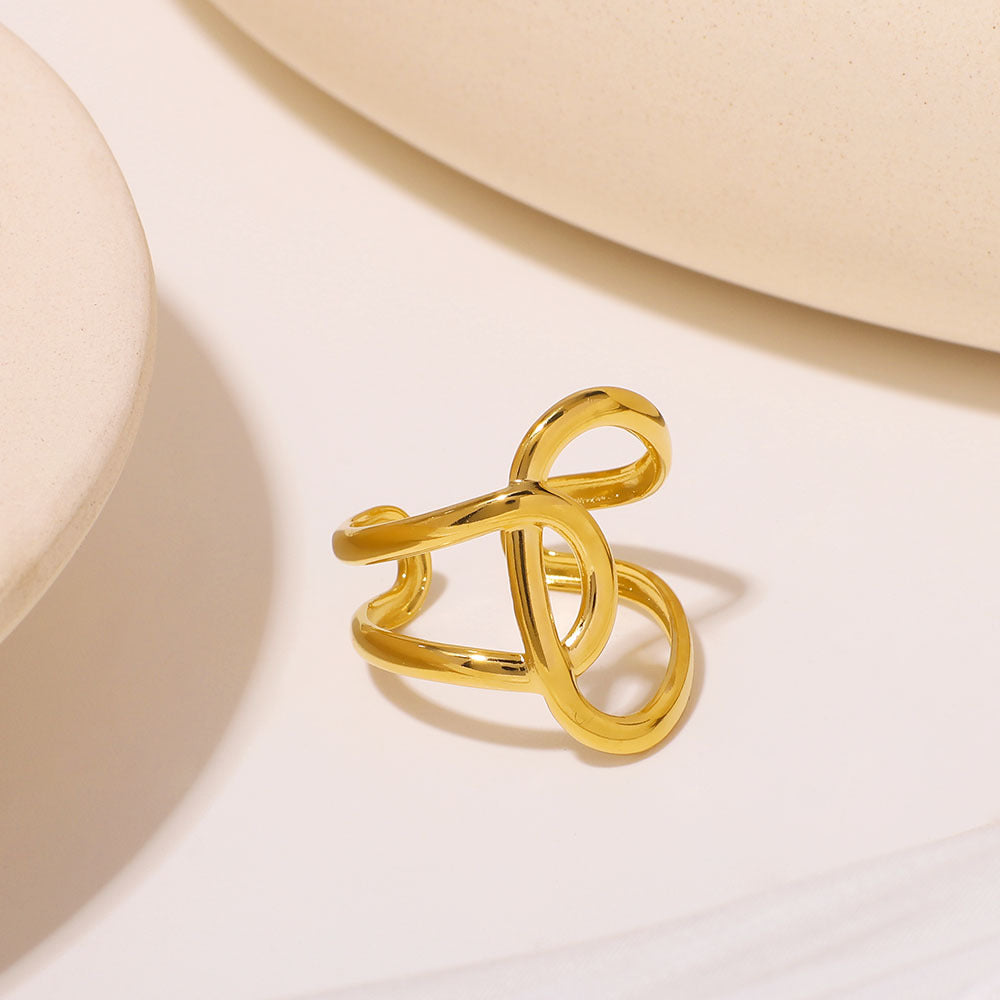 Anello asimmetrico geometrico in acciaio inossidabile placcato oro 18 carati, design avvolgente contemporaneo unisex