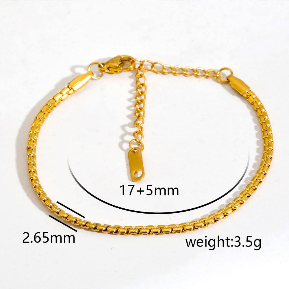 Cavigliera minimalista da donna in acciaio inossidabile placcato oro con piccole perline e ciondolo rotante