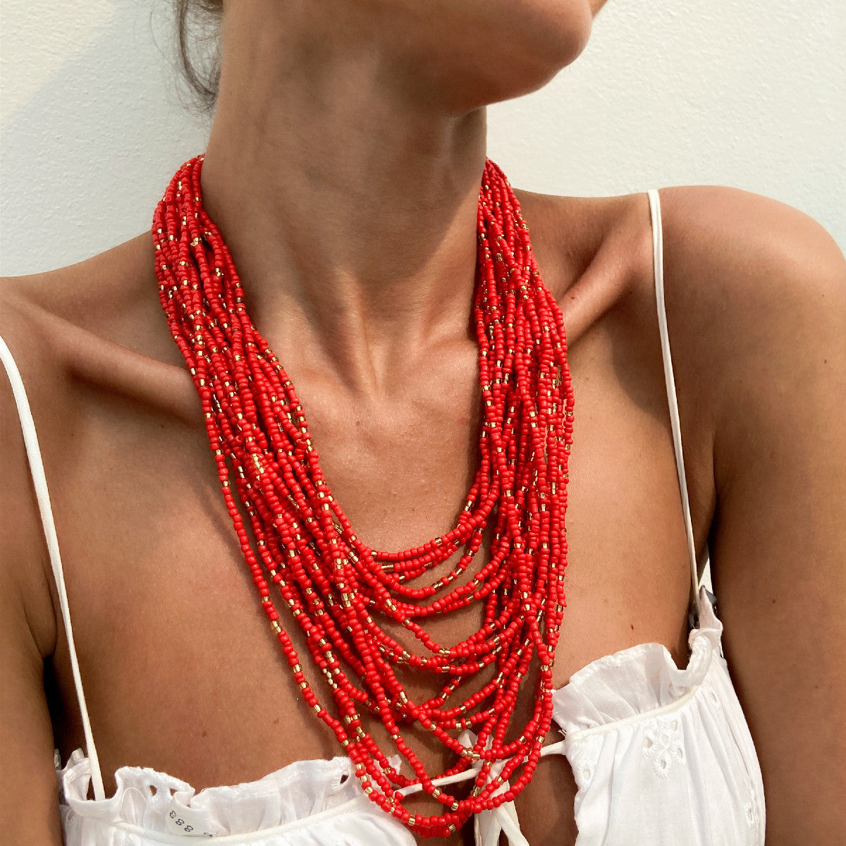 Collana Bohemien Geometrica da Donna con Design a Fili Multistrato Fatti a Mano e Perle