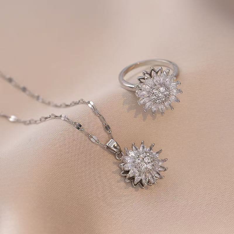 Minimalist Sunflower Pendant Necklace for Women with Rotating Daisy Design, Titanium Steel Snake Chain, Rhinestone Inlay, Geometric Shape