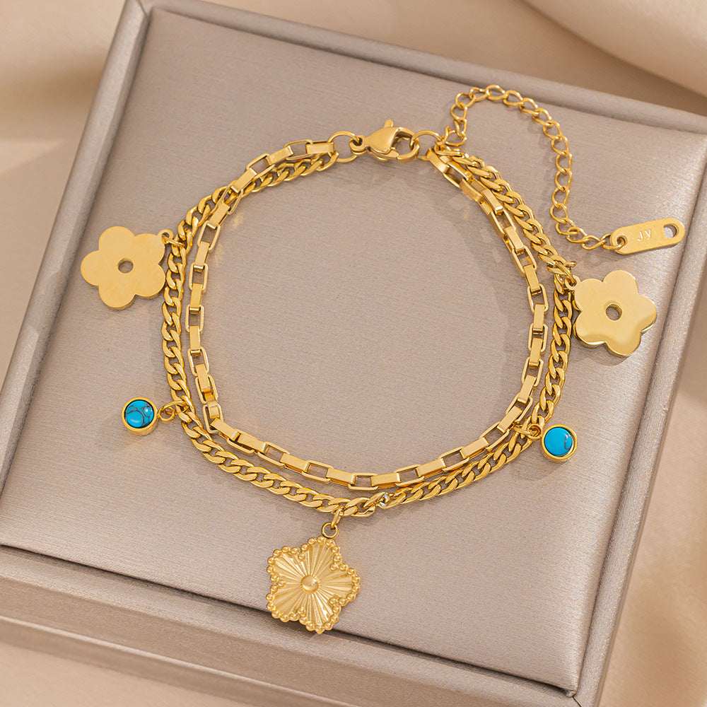 Bracciale da donna in acciaio al titanio con fiore a cinque petali geometrico minimalista, placcatura in oro 18 carati e finitura ipoallergenica