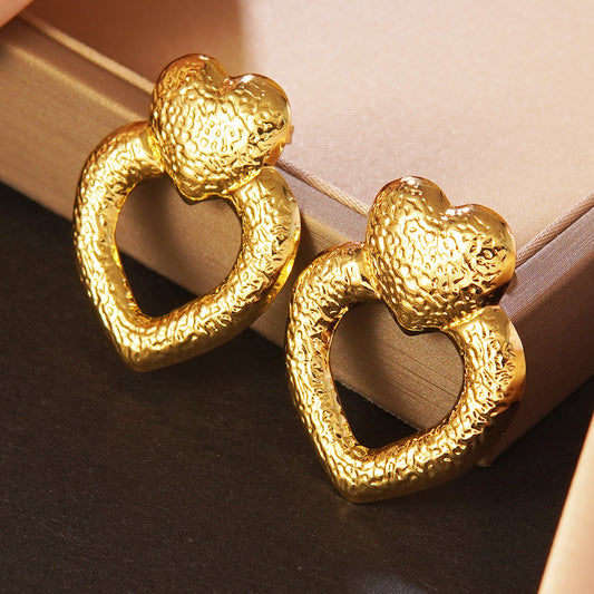 Aretes de lujo elegantes de acero inoxidable en forma de corazón para mujer