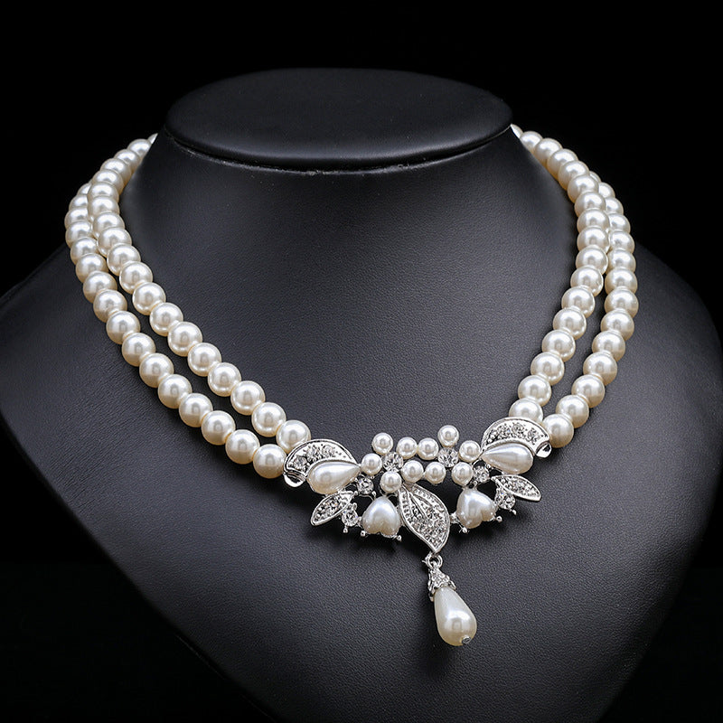 Set di collana e orecchini floreali ispirati a Chanel per donna con lega placcata oro, catena di perline e motivi botanici tra cui grano, petali, foglie e silhouette di alberi