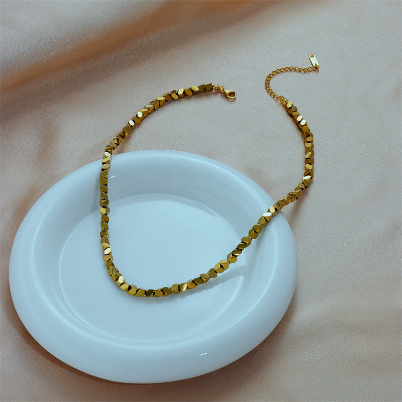 Minimalist Geometric Faceted Titanium Steel Pendant Necklace with Handwoven Chain in Gold Plated Finish
