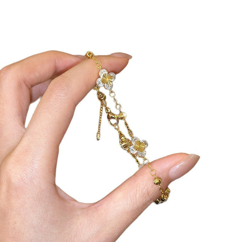 Elegante bracciale da donna regolabile in rame con zirconi a forma di fiore e stile minimalista di lusso