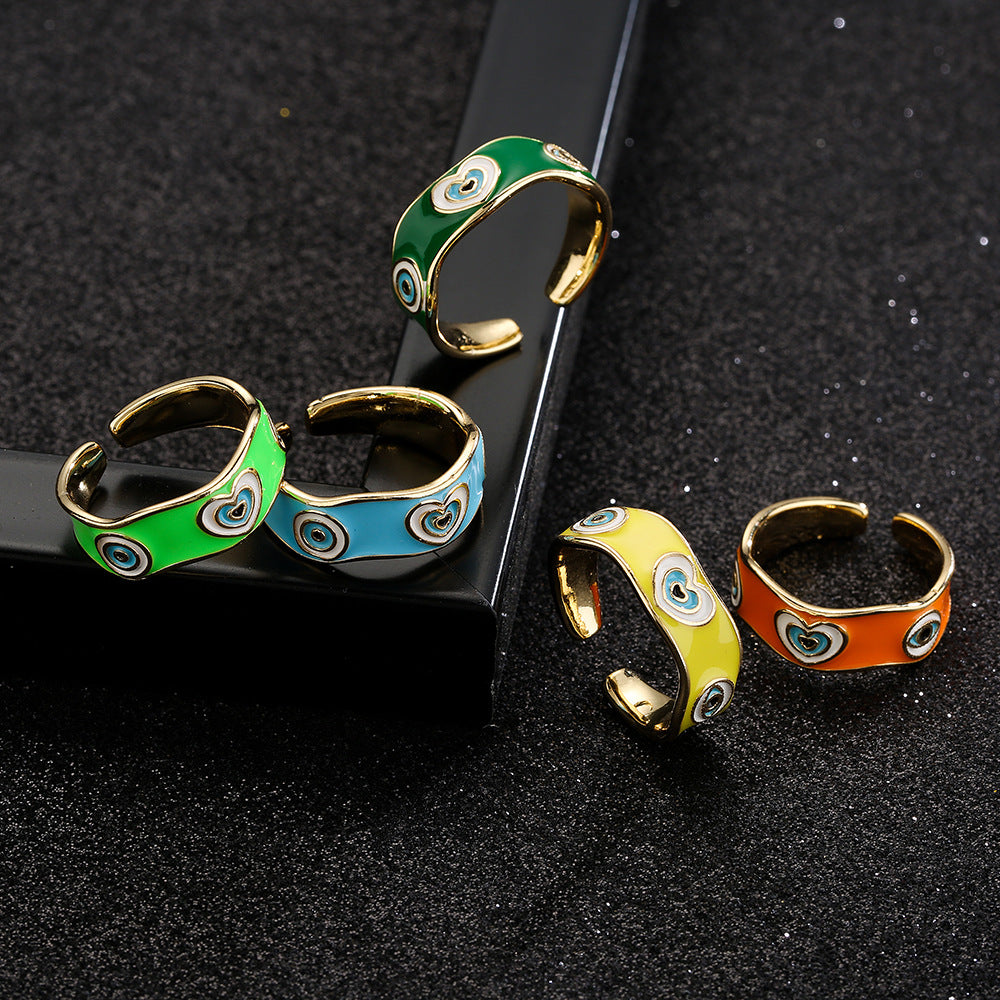 Minimalist Geometric Copper Ring with 18K Gold Plating and Enamel Heart-Eye Pattern