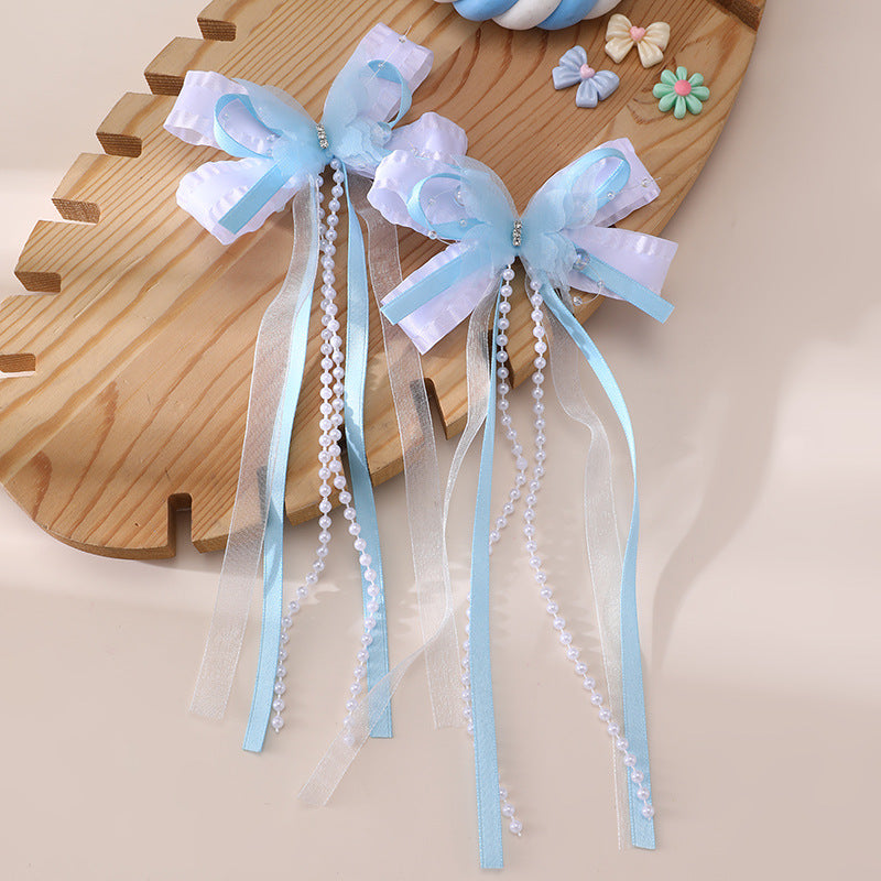 Pinza de pelo en forma de lazo de estilo natural para niños con detalles de volantes y malla hecha de resina plástica