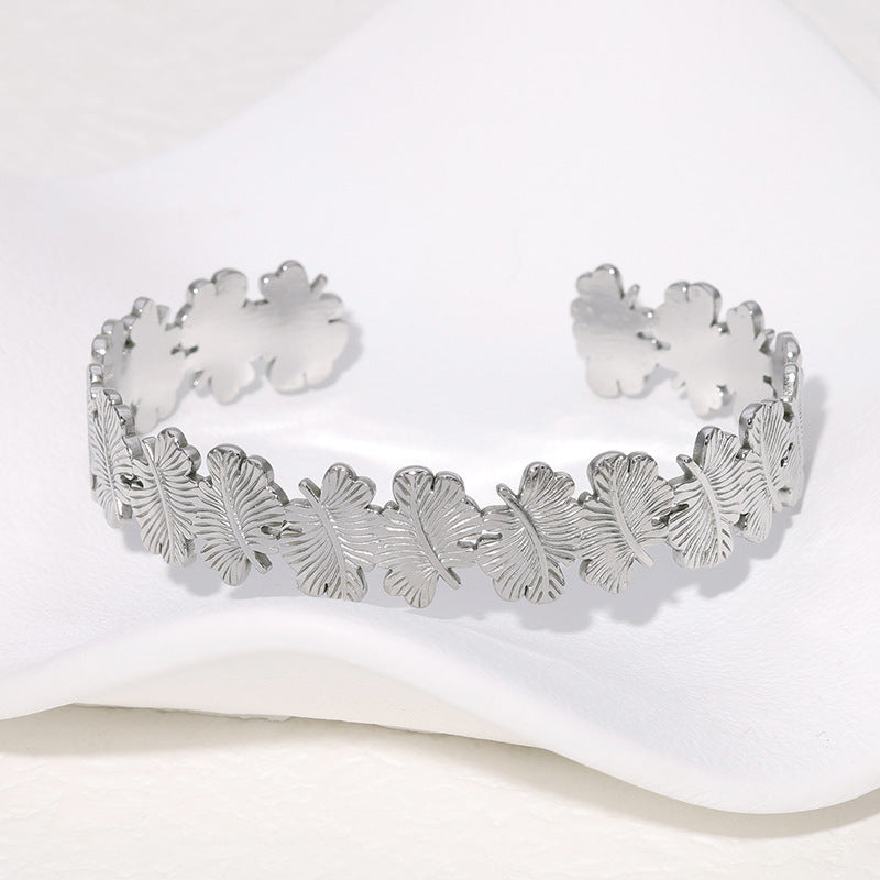 Pulsera de Acero Titanio Minimalista Natural con Forma de Hoja con Baño de Oro para Mujer
