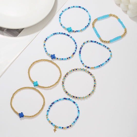 Pulsera Minimalista con Dije de Cruz y Cuentas de Arroz, Acentos de Arcilla Polimérica, Diseño Elástico Apilable Multicapa para Mujer