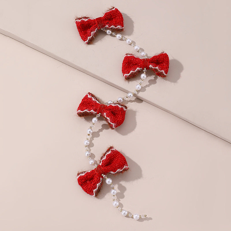Lindo broche para el cabello en forma de lazo con adorno floral blanco, detalles de perlas y borlas para niñas