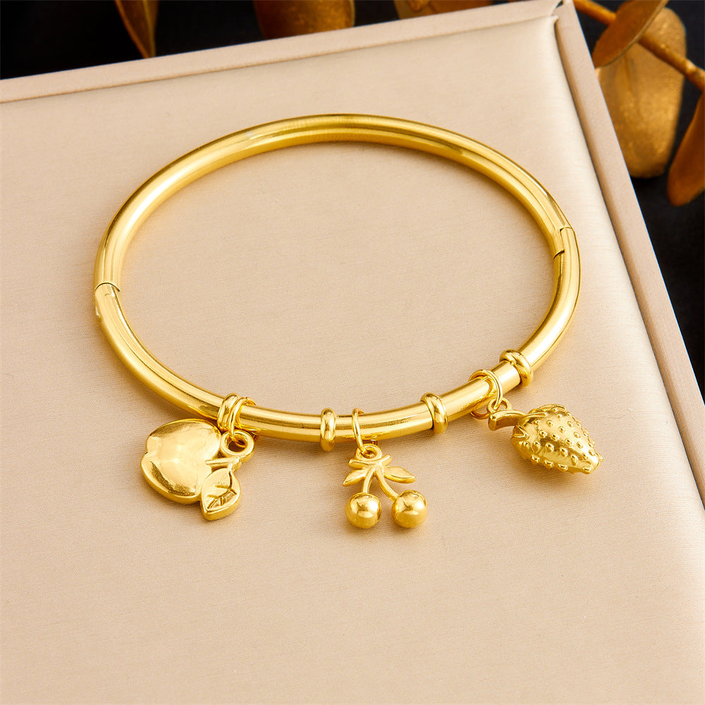 Bracciale Minimalista in Acciaio Inossidabile Placcato Oro a Tema Oceano Tropicale con Motivi di Stella Marina, Conchiglia e Farfalla
