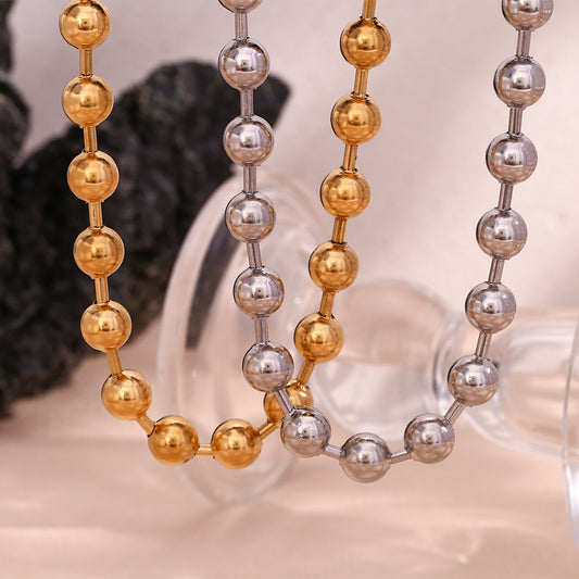 Collana Minimalista Geometrica da Donna con Perline Rotonde in Acciaio Inossidabile Placcato Oro 18K