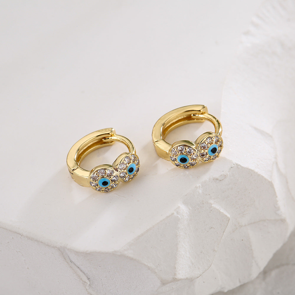 Orecchini Minimalisti Geometrici in Rame con Placcatura in Oro 18K e Dettaglio a Occhio Smaltato con Intarsio di Zirconi