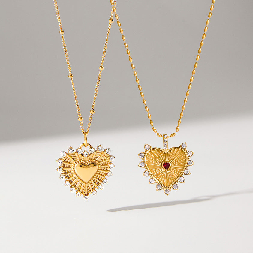 Collana pendente minimalista a forma di cuore in acciaio al titanio con finitura placcata da donna
