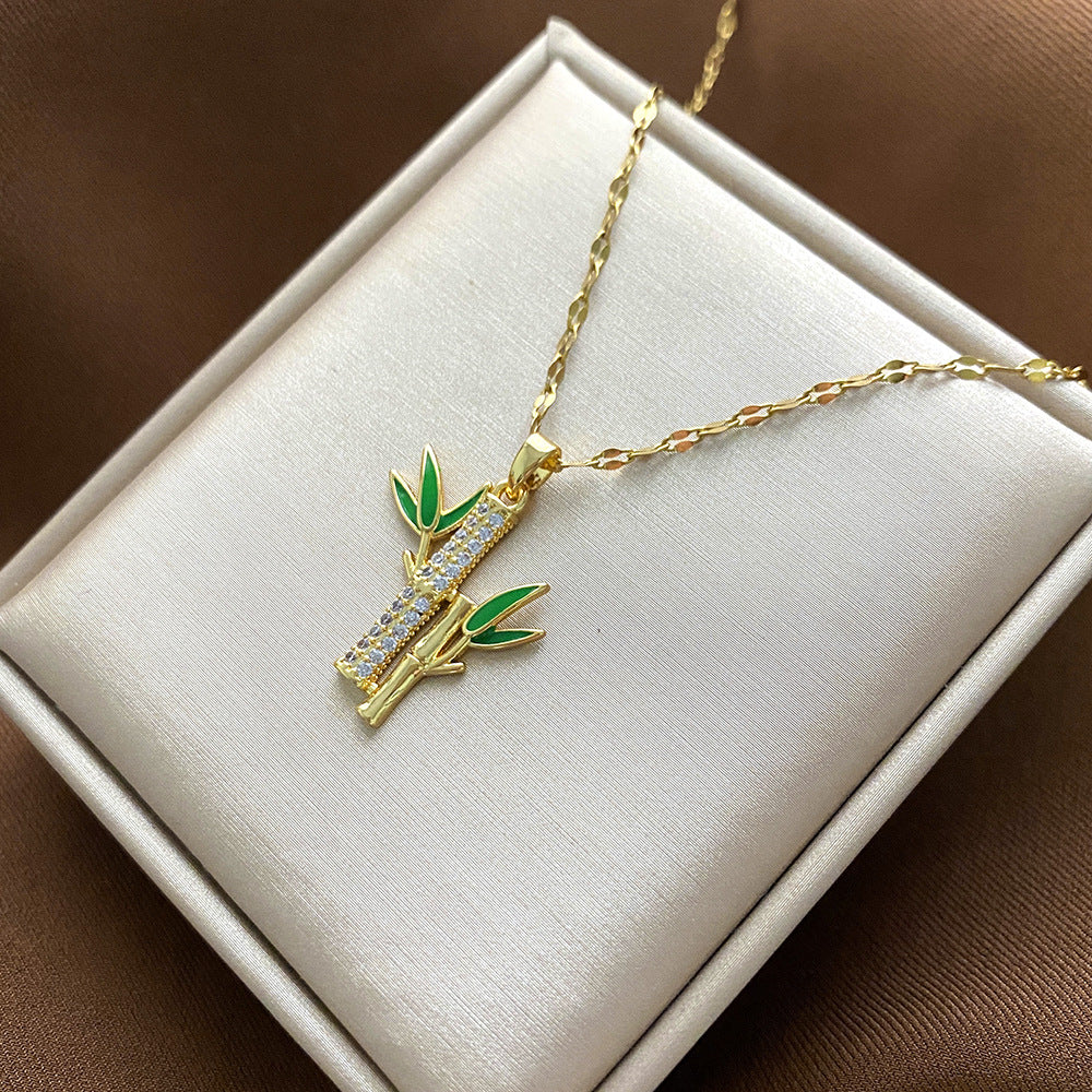 Collana Pendente Floreale Minimalista da Donna e Uomo in Acciaio al Titanio con Finitura Placcata e Catenina a Croce