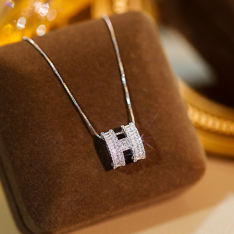Luxury Minimalist Geometric Letter H Pendant Necklace for Women in Titanium Steel with Gold Plating, Wavy Chain Style