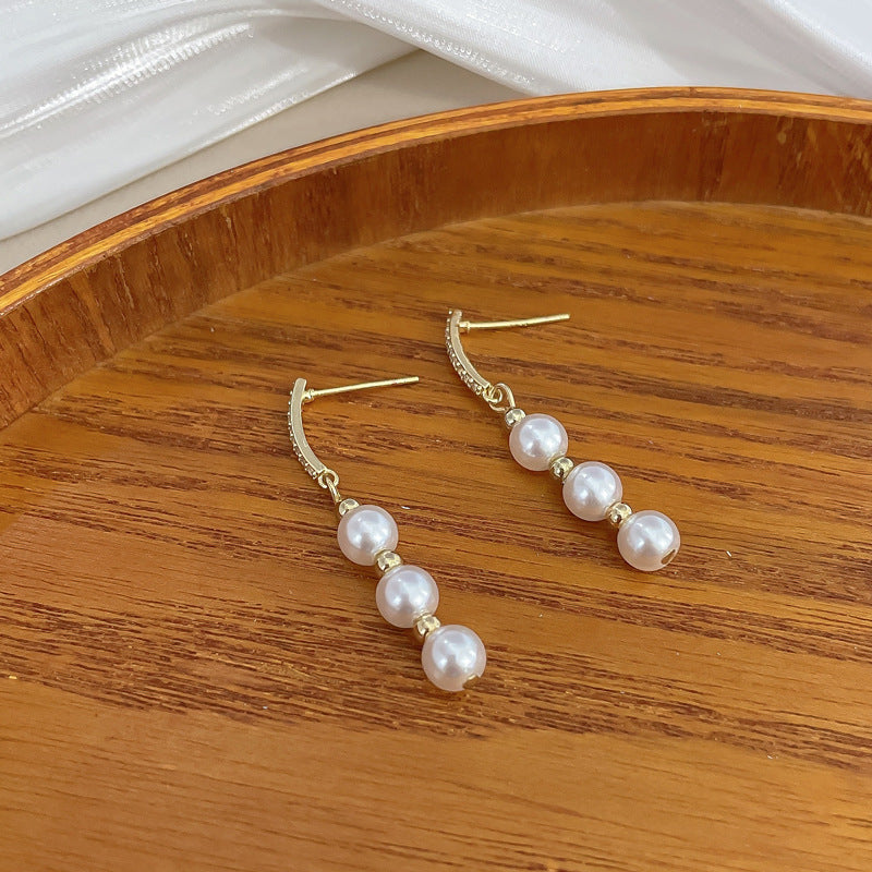 Pendientes colgantes geométricos elegantes para mujer con incrustaciones de diamantes de imitación y base de cobre chapado en oro