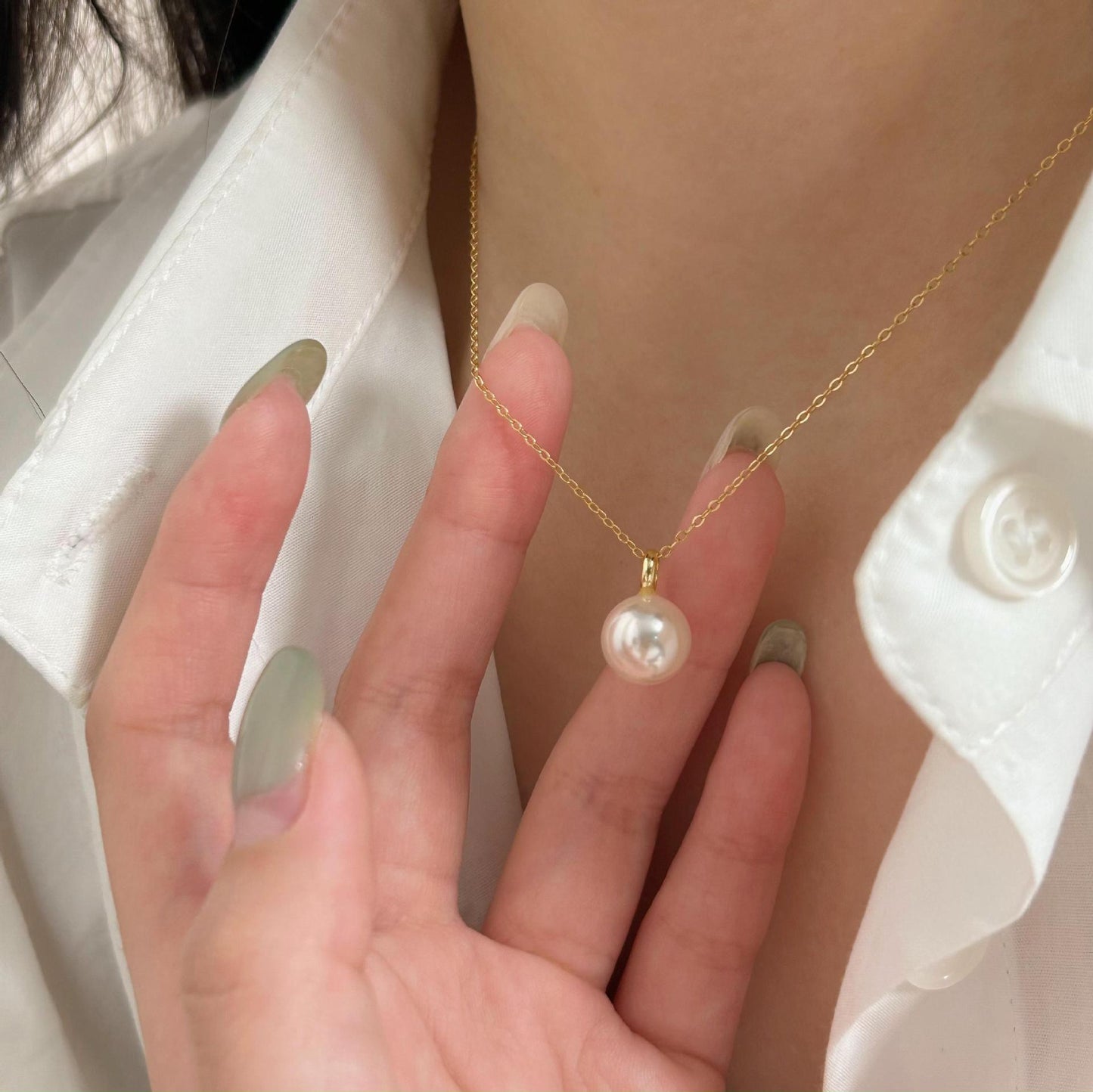 Minimalist Geometric Pearl Necklace in 925 Sterling Silver with Gold Plating on Cross Chain