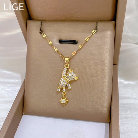 Collana con ciondolo a orso minimalista Starburst in acciaio inossidabile con intarsio di strass per donna e uomo, delicata catena clavicolare