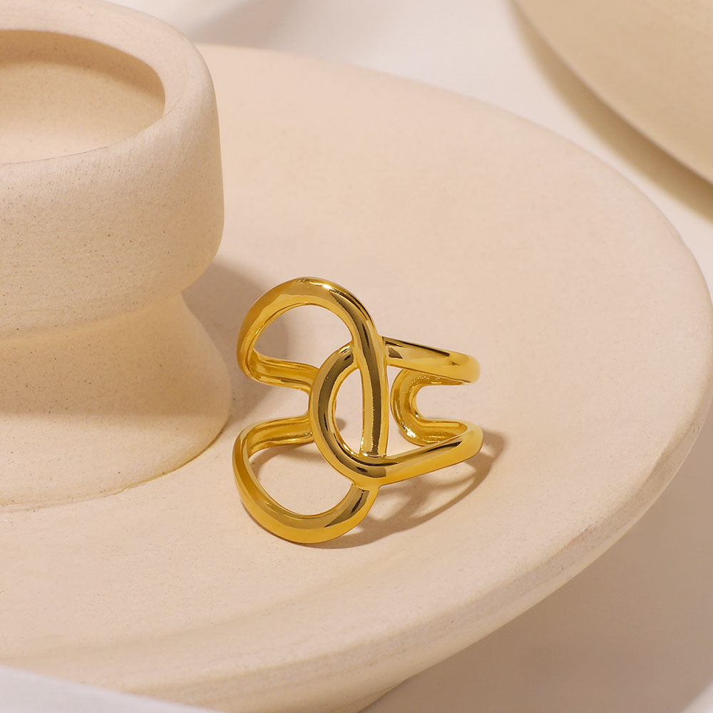 Anello asimmetrico geometrico in acciaio inossidabile placcato oro 18 carati, design avvolgente contemporaneo unisex