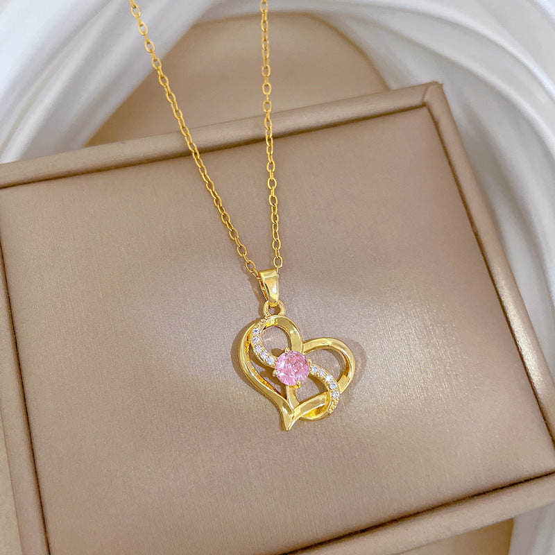 Collana da donna in acciaio al titanio a forma di cuore irregolare con finitura placcata, ciondolo geometrico minimalista e catena sottile a medaglione