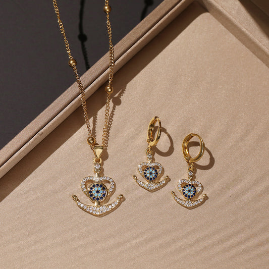 Conjunto de collar y pendientes minimalistas geométricos de ojo turco en latón con baño de oro e incrustaciones de circonitas