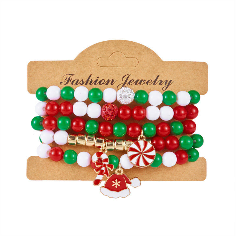 Pulsera minimalista con temática navideña con diseño de Papá Noel, bastón, muñeco de nieve, cuentas con letras y dije de aleación