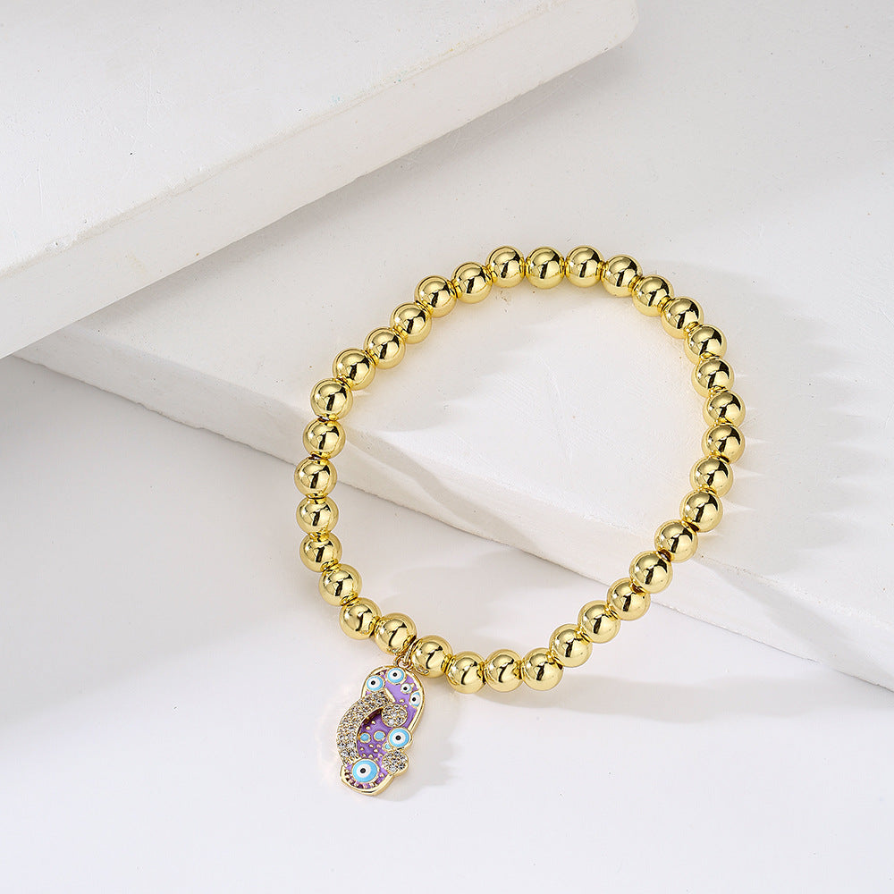 Minimalist Geometric Pendant Bracelet for Women with 18K Gold Plated Copper Beads and Enamel Zirconia Slipper Charm