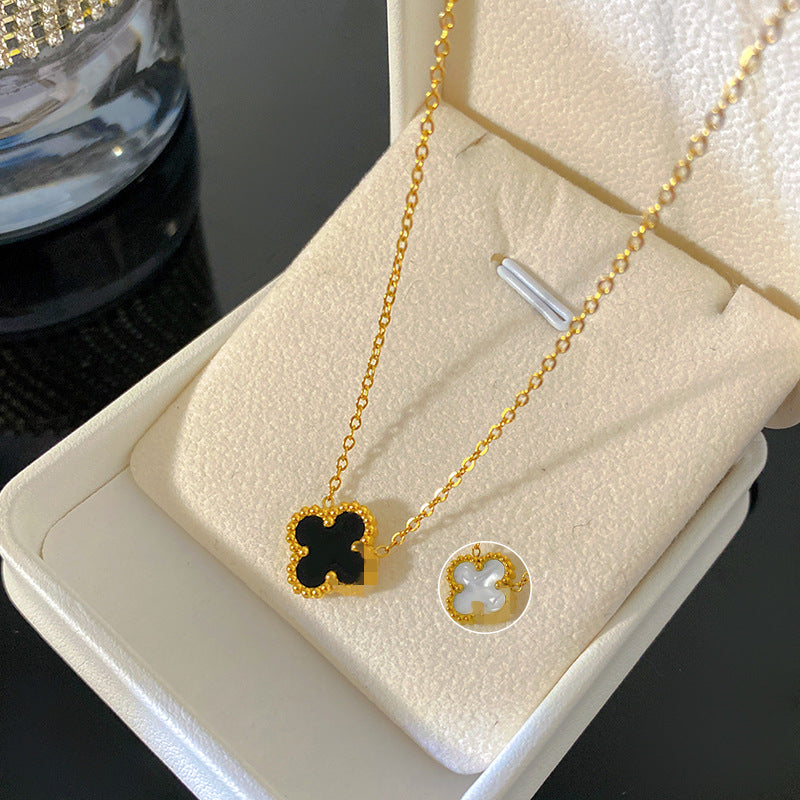 Blue Four-Leaf Clover Titanium Steel Necklace with 18K Gold Plated Double-Sided Black and White Pendant