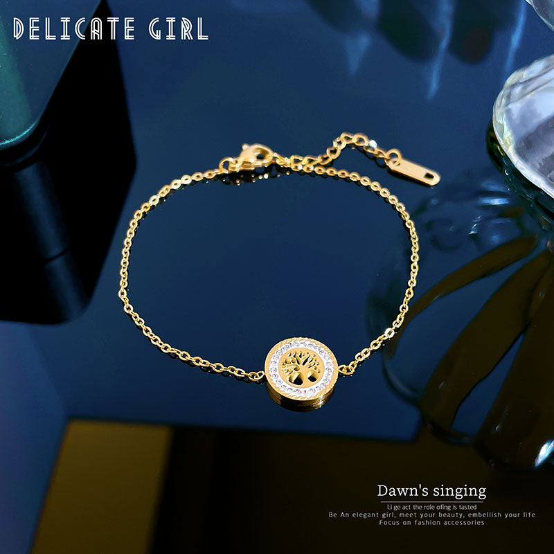 Bracciale da donna in stile vintage con disco rotondo "Albero della Vita" in acciaio al titanio con intarsio in strass e placcatura in oro