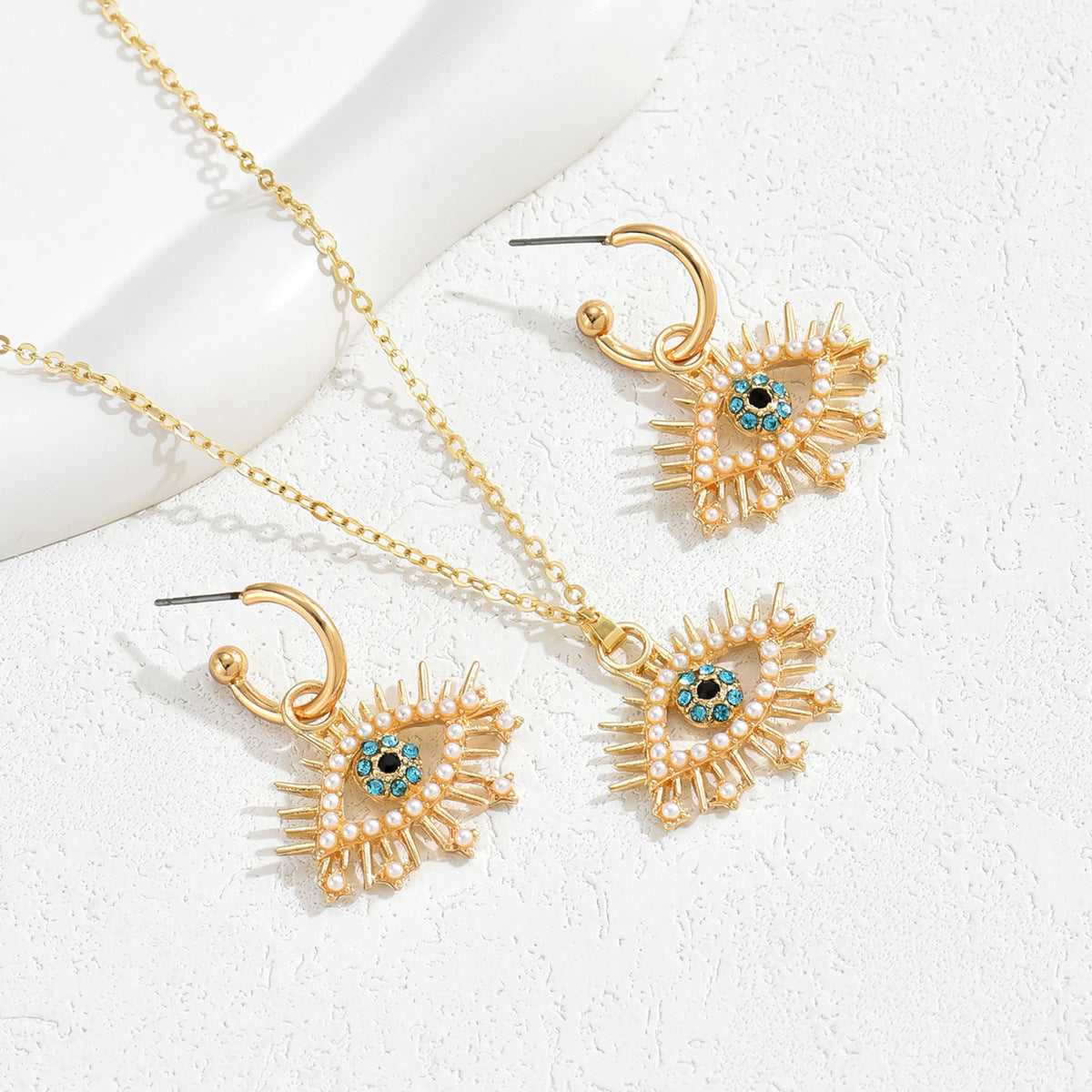 Conjunto de collar con colgante minimalista de ojo de ángel con incrustaciones de pedrería en aleación para mujer, cadena larga de clavícula y pendientes a juego