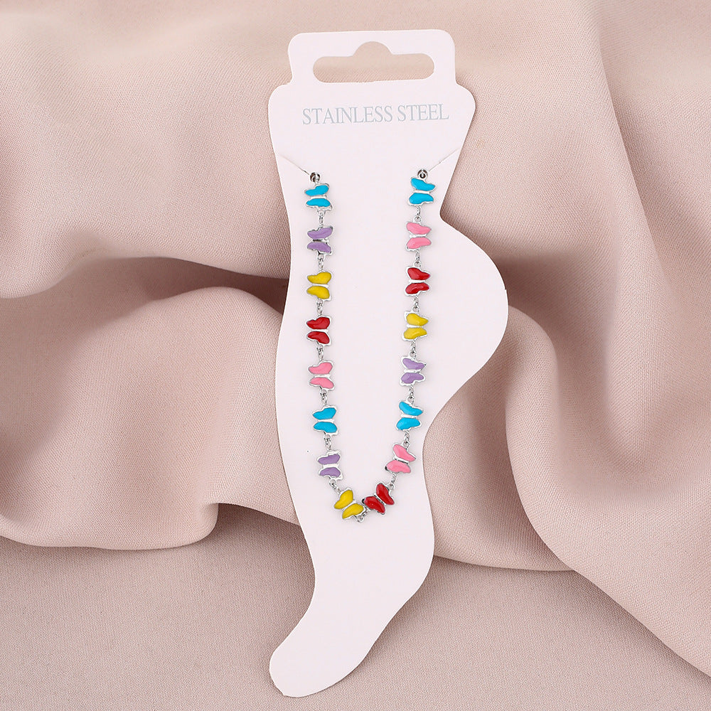 Elegante cavigliera da donna in acciaio al titanio a forma di farfalla con smalto, accessorio di moda dal design geometrico