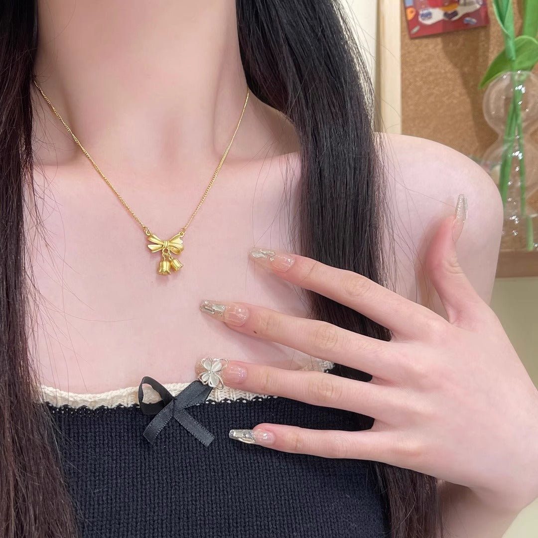 Original Design Floral Bow Knot Orchid Pendant Necklace for Women and Men in Titanium Steel with Plated Finish and O-Chain